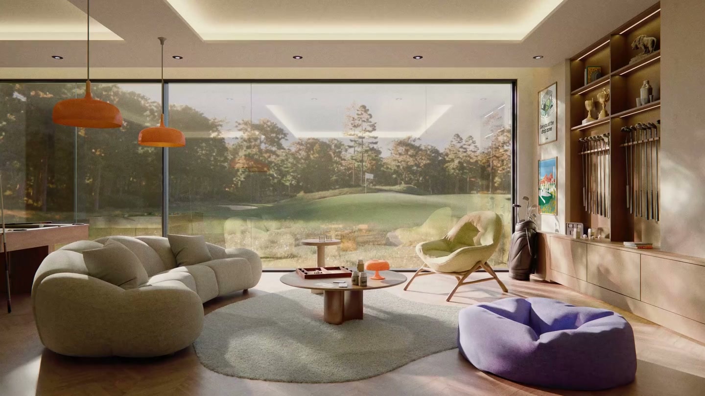 Rounds clubhouse interior with curved seating, branded objects and a view across the golf course