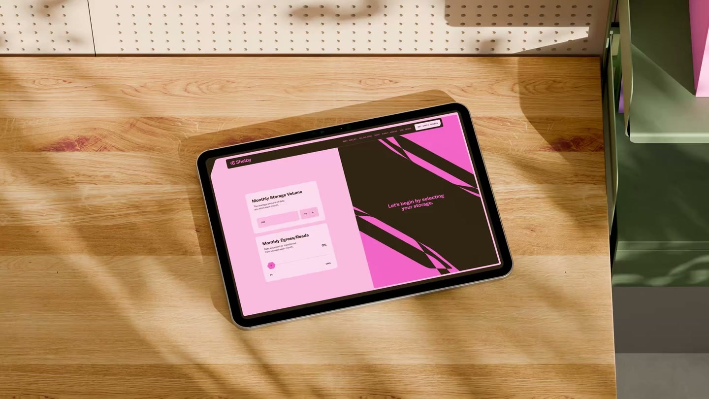 Shelby interface on an iPad resting on a sunlit wooden desk
