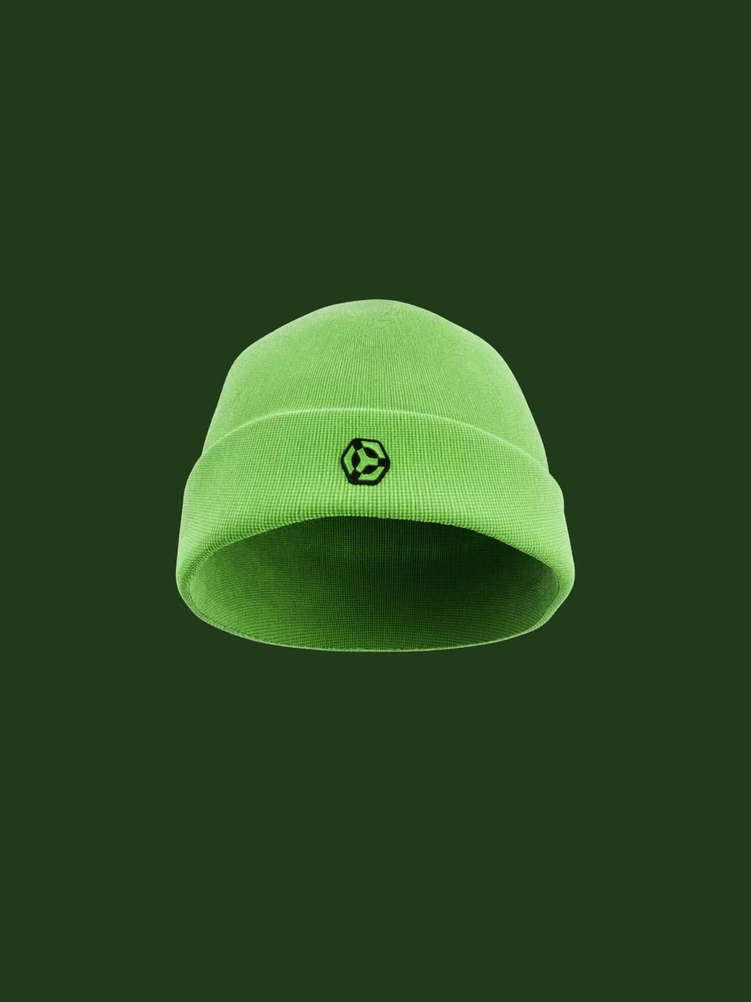 Green Shelby beanie and T-shirt presented on a dark green background